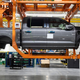 A photo of a Ford F-150 Lightning body on the factory floor.
